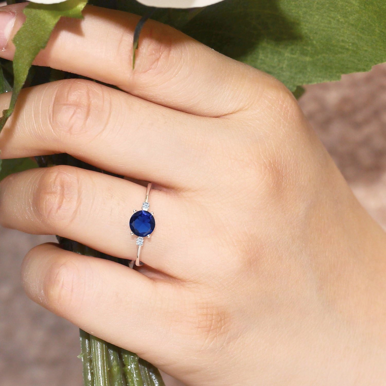 Gem Stone King 10K White Gold Blue Created Sapphire and White Created Sapphire Solitaire Engagement Ring For Women (0.78 Cttw, Round 6MM, Gemstone September Birthstone, Available in Size 5,6,7,8,9)