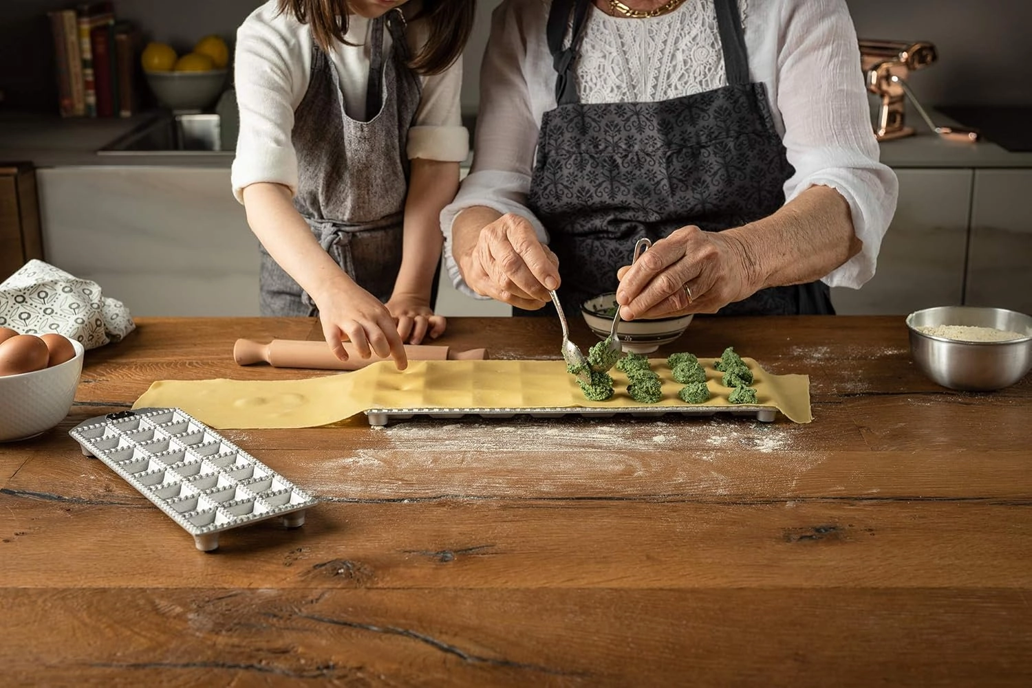 MARCATO Made in Italy RAVIOLI LIKE A PRO 7-Piece Kit. Includes ravioli mold, rolling pin, 3 ravioli stamps, long apron, cloth and cookbook