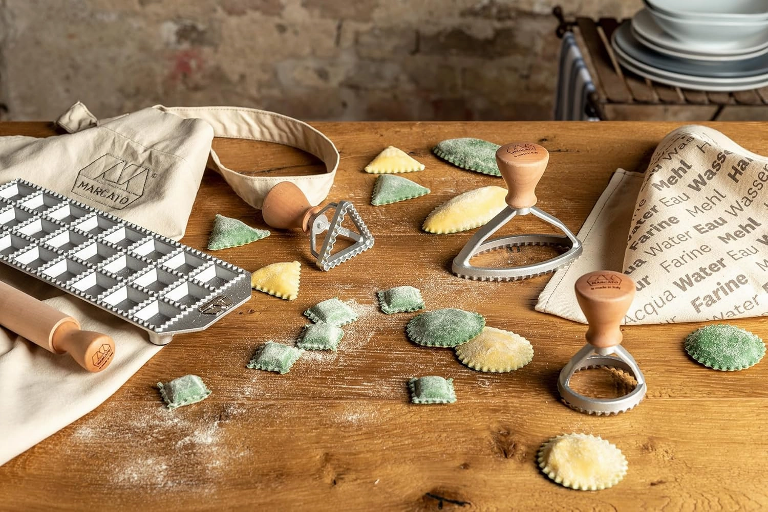 MARCATO Made in Italy RAVIOLI LIKE A PRO 7-Piece Kit. Includes ravioli mold, rolling pin, 3 ravioli stamps, long apron, cloth and cookbook