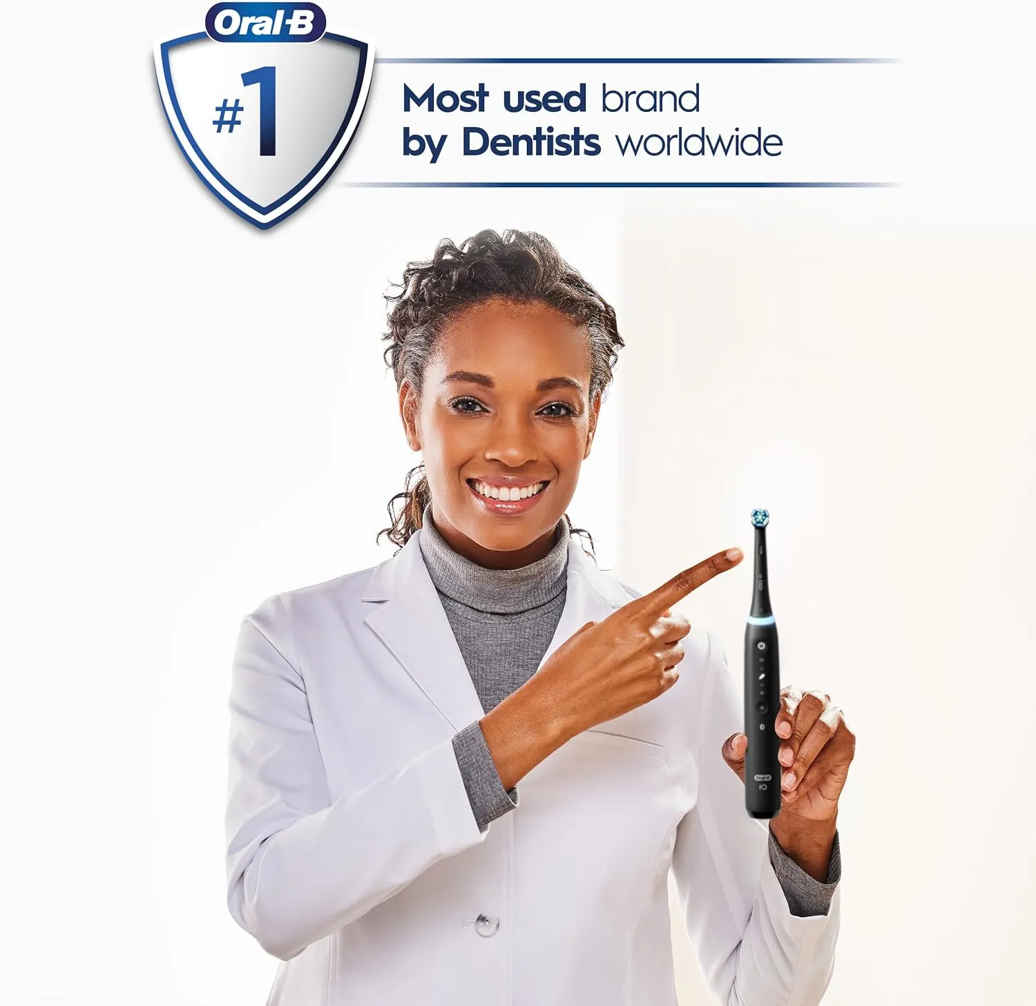 Oral-B iO Series 5 Ultimate White Rechargeable Electric Toothbrush with Visible Pressure Sensor, 2 Minute Timer, 5 Cleaning Settings, 1 Replacement Toothbrush Heads, and Travel Case, White